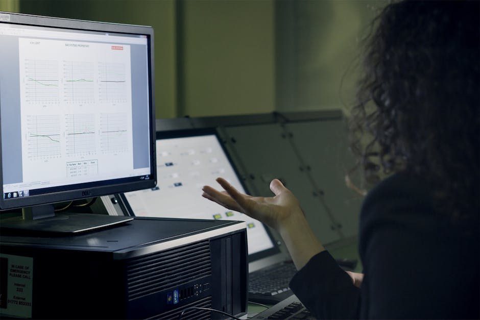 An image showing a person analyzing website data on a computer.